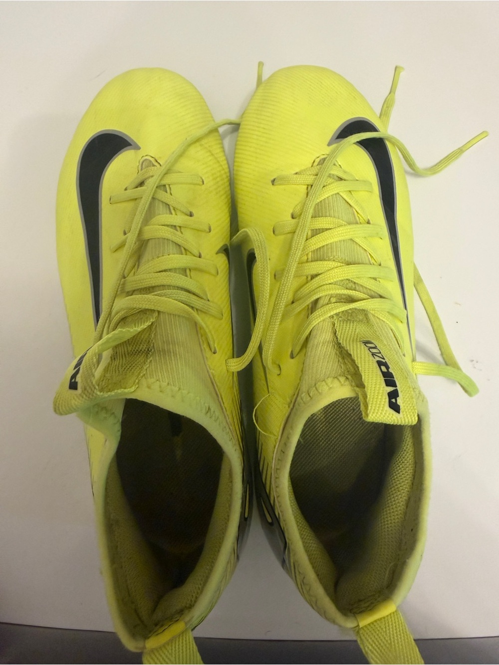 Nike Neon Yellow Cleats - size Y4